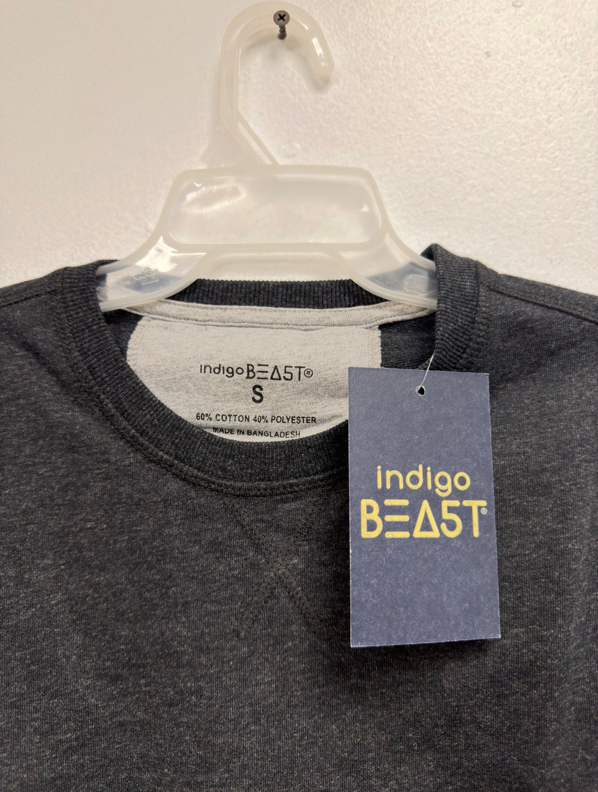 Indigo Beast charcoal heather top, neck label (Made in Bangladesh) and hang tag