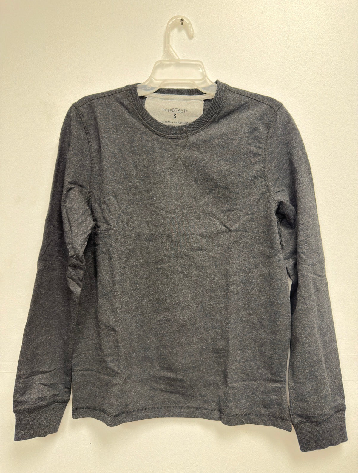 Indigo Beast charcoal heather long-sleeve crew neck top on hanger, front