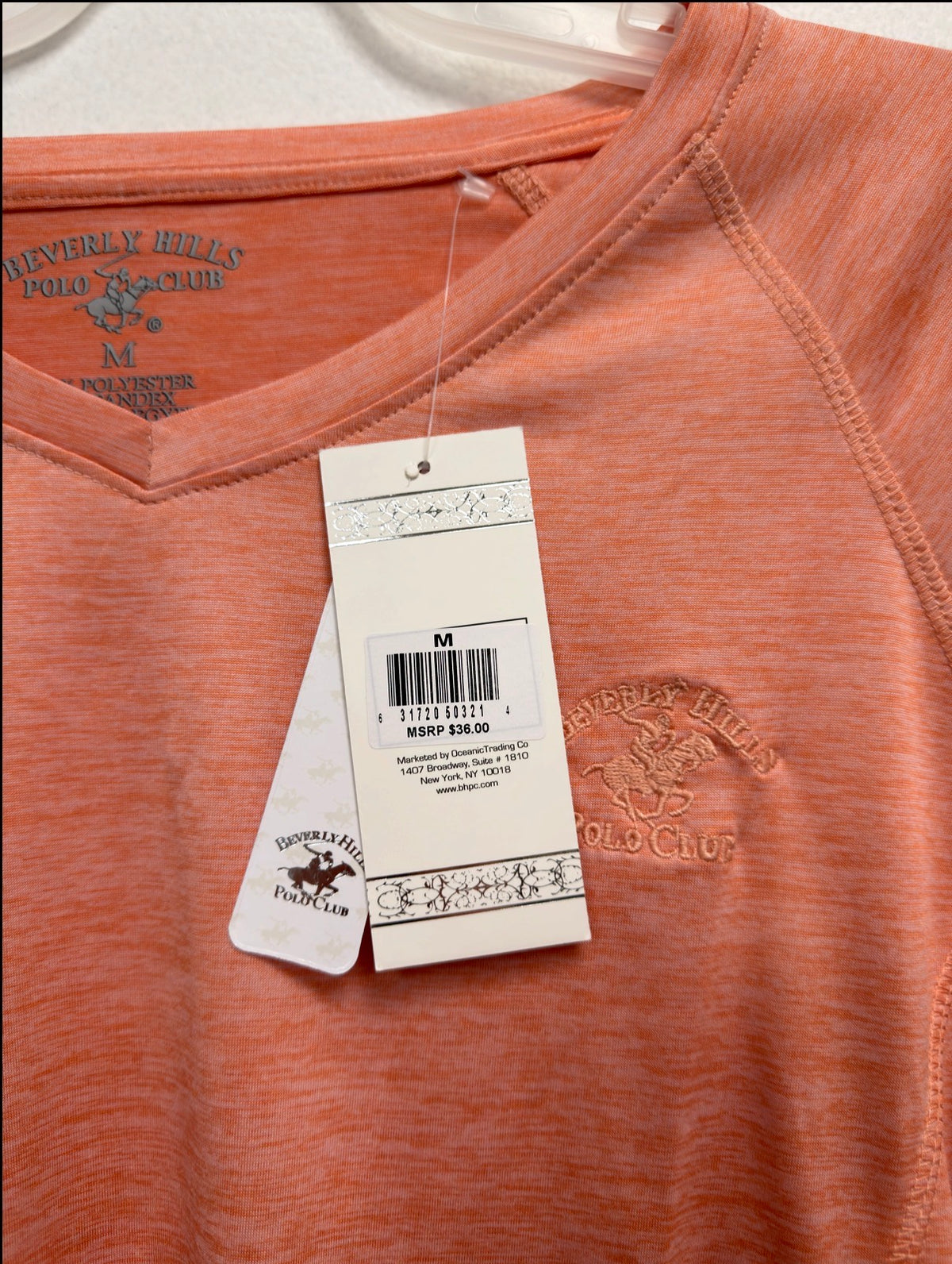 Beverly Hills Polo Club orange top, tag close-up