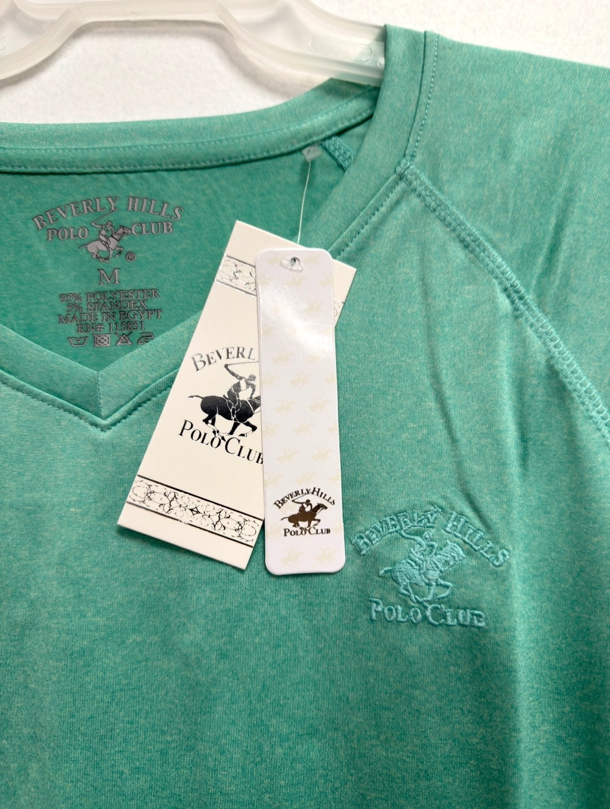 Beverly Hills Polo Club green V-neck top, neckline and hang tag